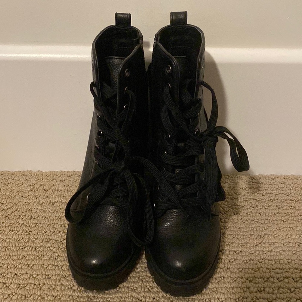 Black Steve Madden combat boots with heel